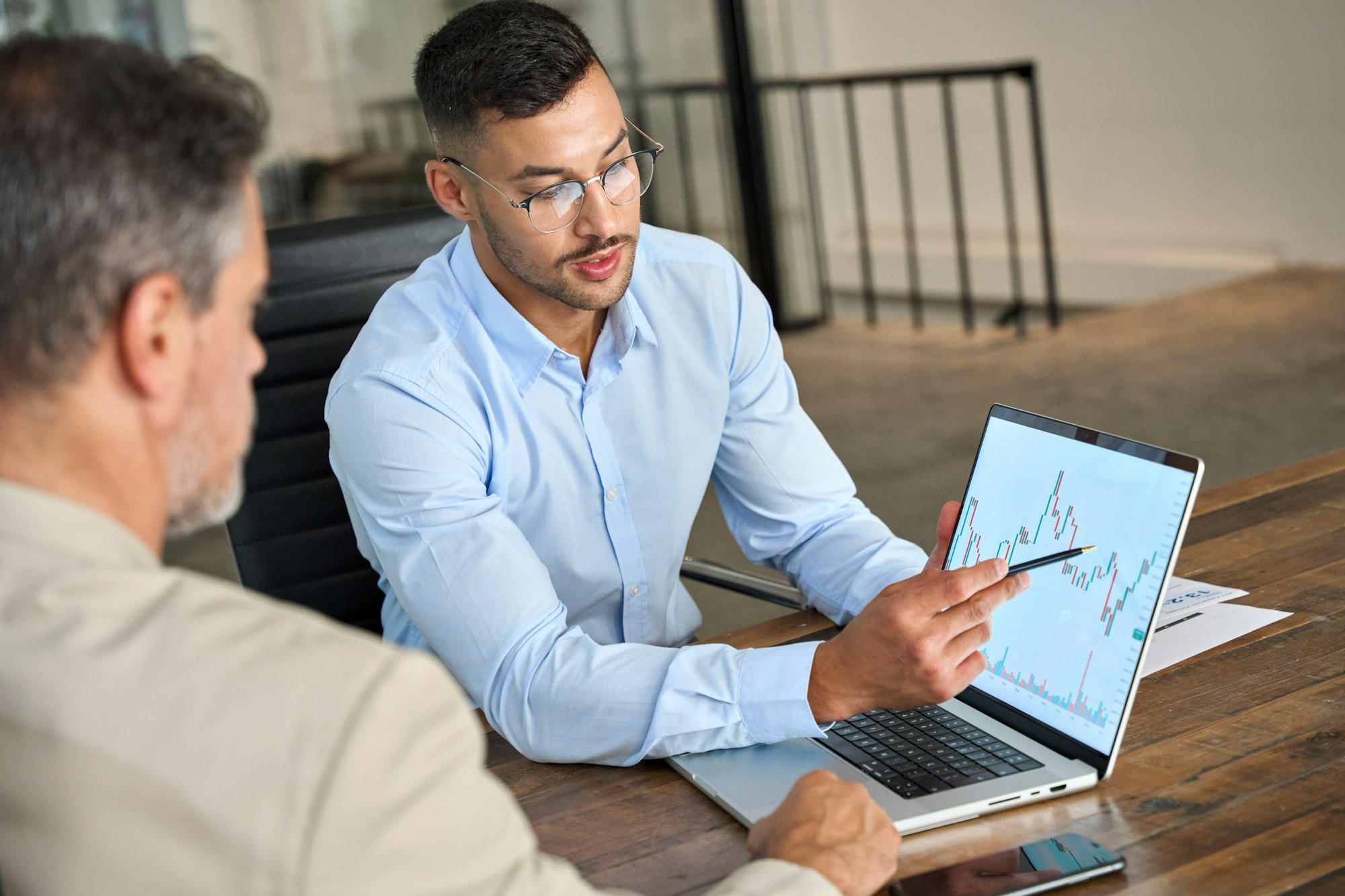 Financial advisor explaining invest stock market data consulting investor.